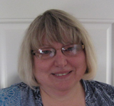 Joyce Mader, President